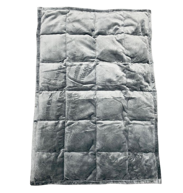 Objets lestés : comment aident-ils vos enfants ? - Coussin lesté couvre-jambes